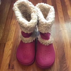 Pink Crocs boots